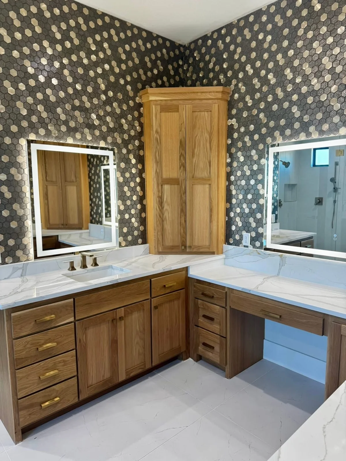 Freestanding tub with gold plumbing fixtures